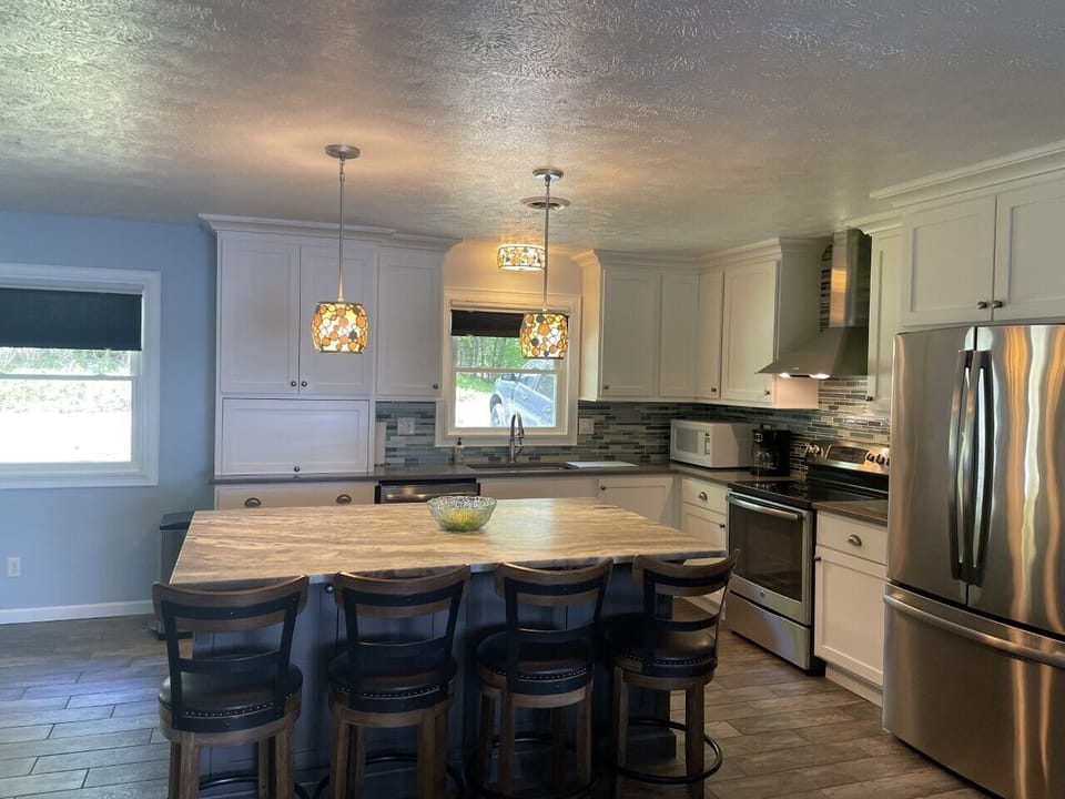 Upstairs/Main living area Kitchen bar/open concept to living room