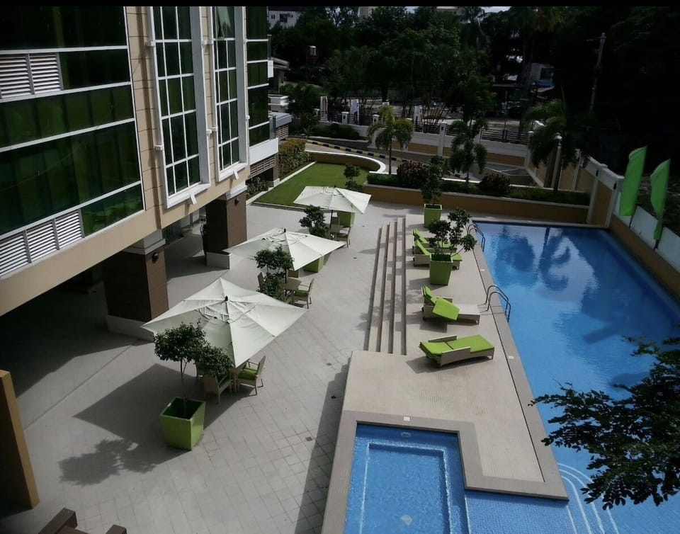 Air view swimming pool from the balcony at 3rd floor 