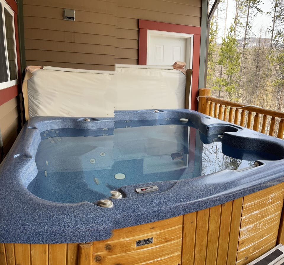 Private hot tub on balcony.