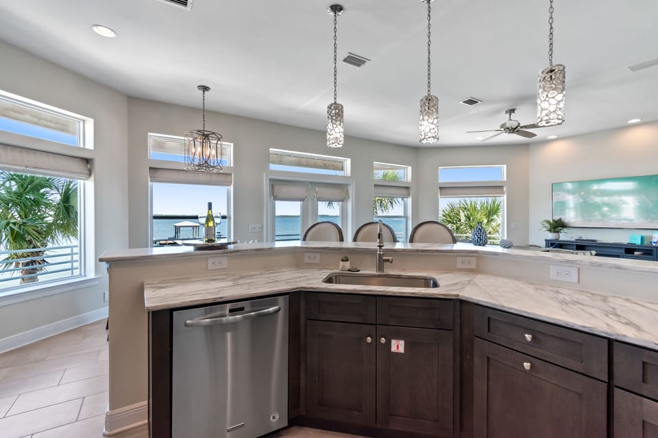 Open kitchen with breakfast bar seating