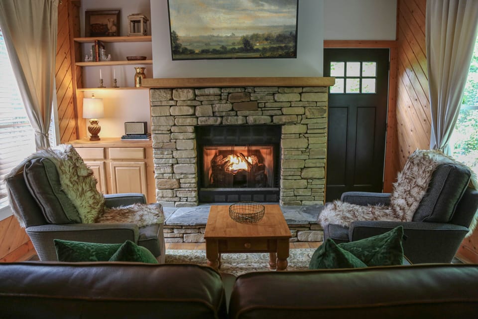 Fireplace seating area in living room 