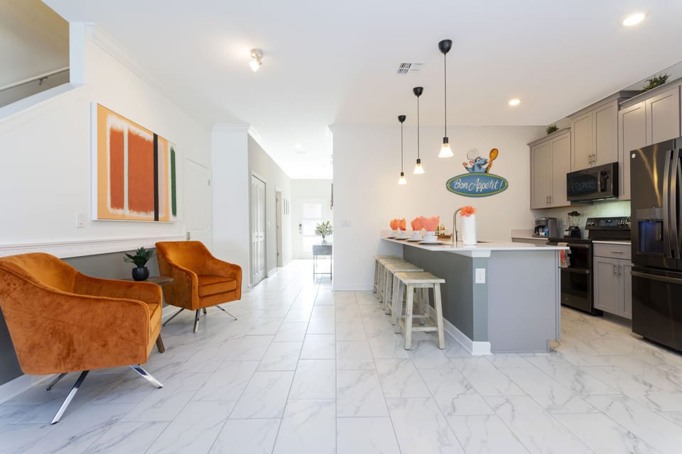 Family Townhome, 5 Bedrooms | Living area | 60-inch Smart TV with cable channels, Netflix, Hulu