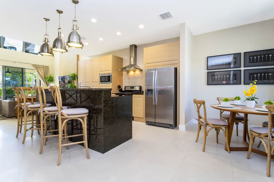 Family Townhome, 4 Bedrooms | Private kitchen | Full-size fridge, microwave, oven, stovetop