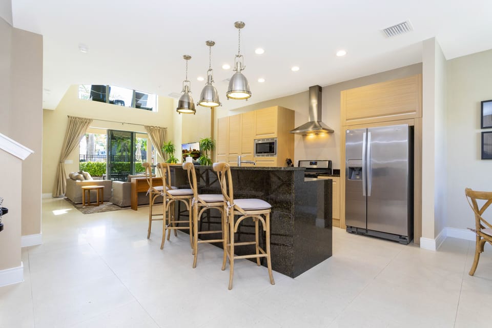Family Townhome, 4 Bedrooms | Living area | 60-inch Smart TV with cable channels, TV, Netflix