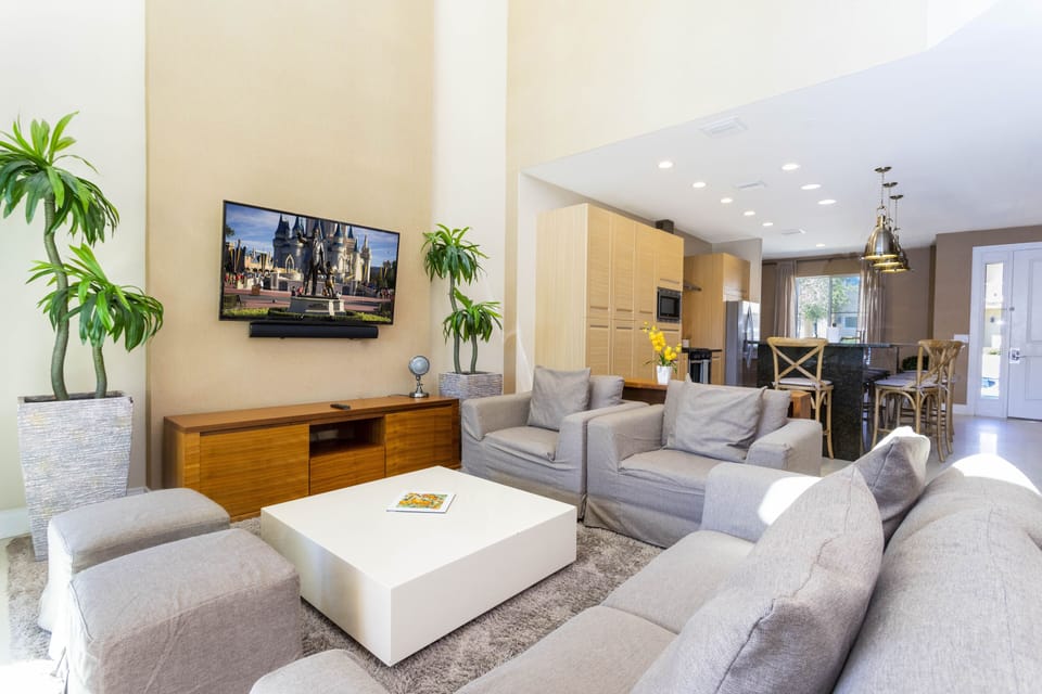 Family Townhome, 4 Bedrooms | Living area | 60-inch Smart TV with cable channels, TV, Netflix