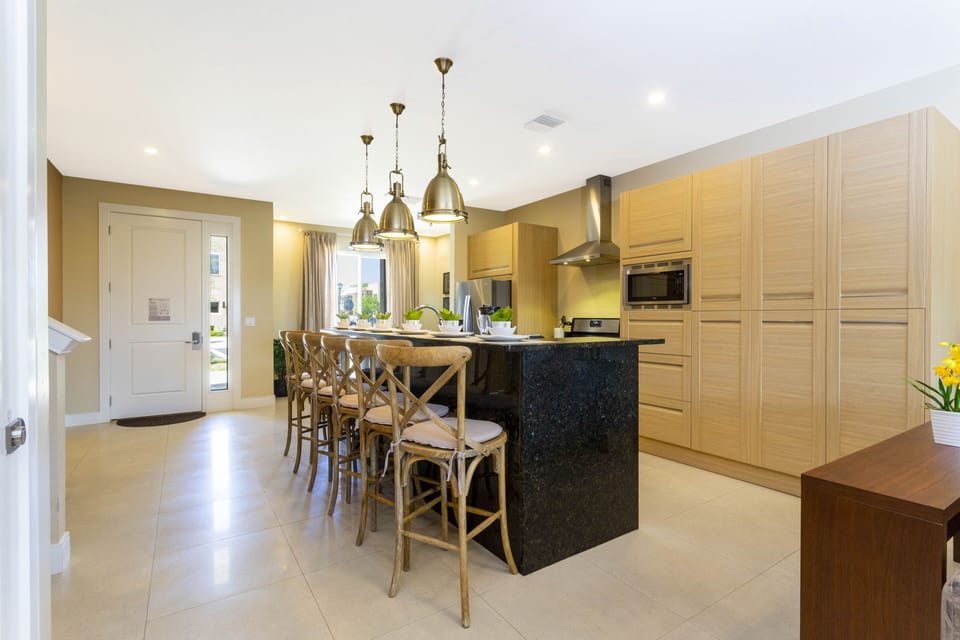 Family Townhome, 4 Bedrooms | Private kitchen | Full-size fridge, microwave, oven, stovetop