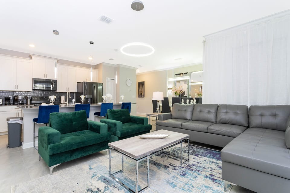 Family Townhome, 4 Bedrooms | Living area | 60-inch Smart TV with cable channels, Netflix, Hulu