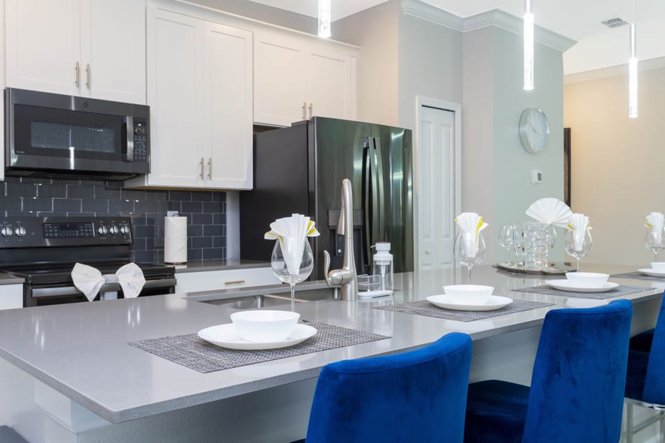 Family Townhome, 4 Bedrooms | Living area | 60-inch Smart TV with cable channels, Netflix, Hulu
