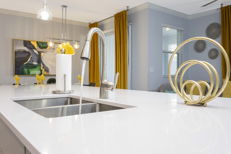 Family Townhome, 4 Bedrooms | Private kitchen | Full-size fridge, microwave, oven, stovetop