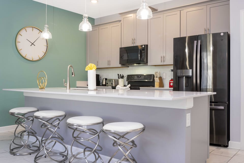 Family Townhome, 4 Bedrooms | Living area | 60-inch Smart TV with cable channels, Netflix, Hulu