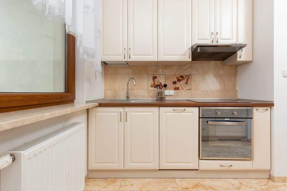The kitchenette's practical layout maximizes space and functionality.