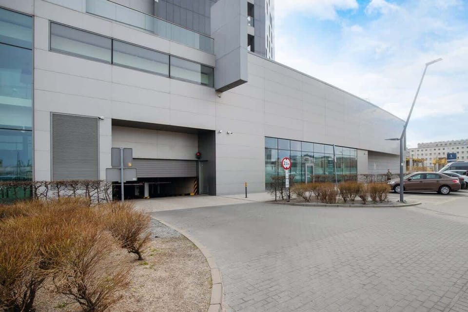 The building's stylish design complements its surroundings.