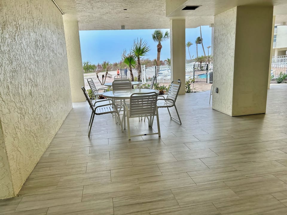 Ground floor sitting area with large tv for gatherings