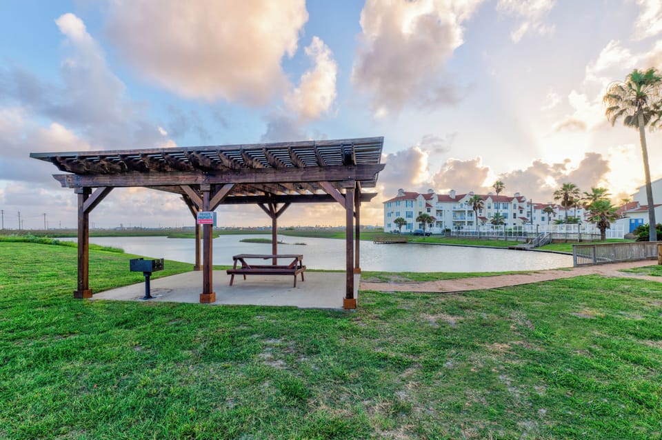 Waterfront park area with covered pavilion and scenic lake views near the property.