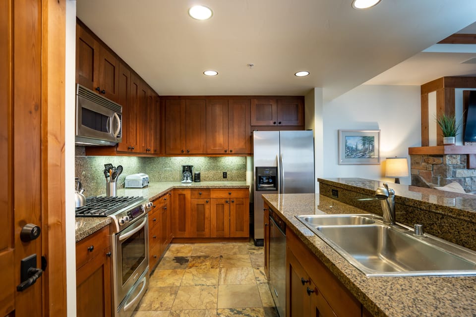 Fully equipped kitchen for cooking meals and entertaining