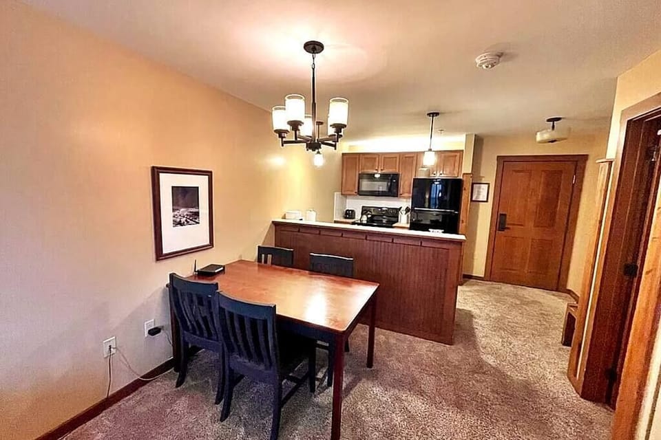 Kitchen opens to dining space great for gathering together