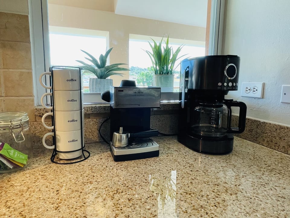 Coffee and espresso maker. Coffee, tea, sugar and creamer provided.