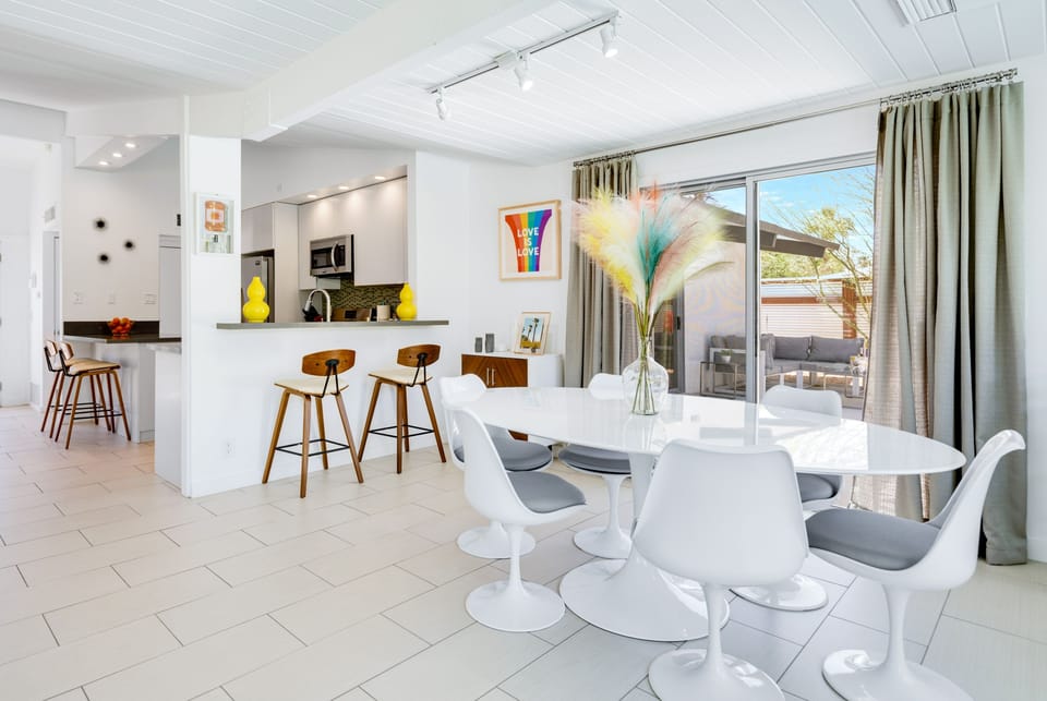 Dining area with seating for 6, overlooking the stunning backyard