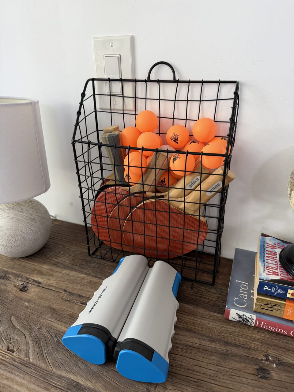 Game-ready corner with ping pong gear for easy indoor fun
