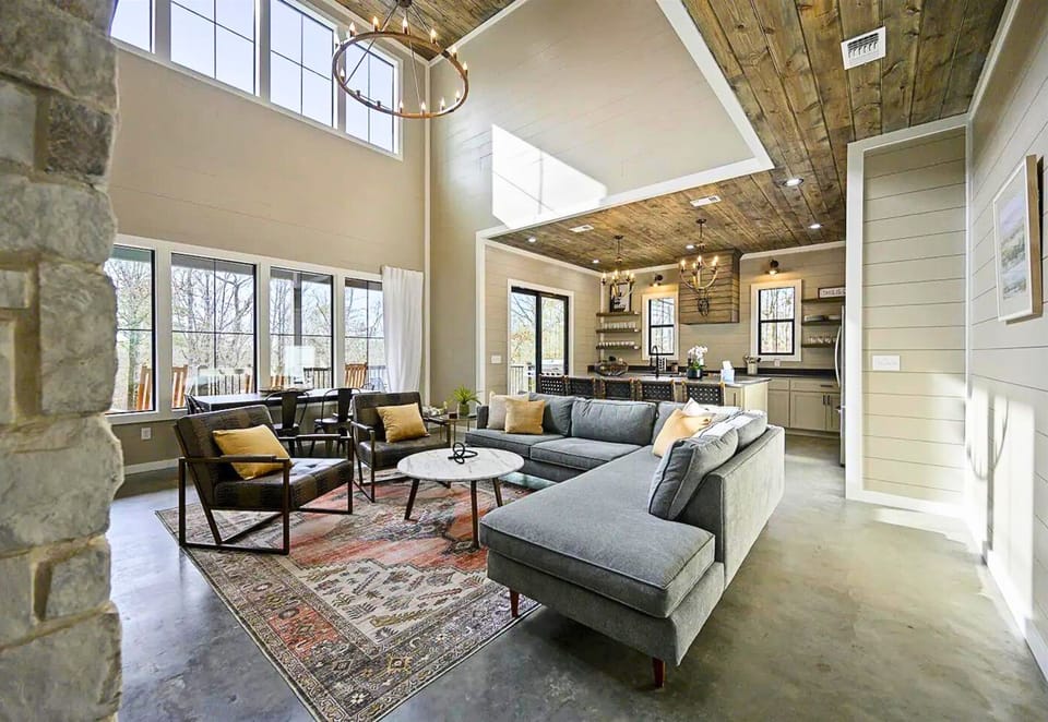 Step into a space where high ceilings meet chic comfort, the perfect setting to relax and recharge.