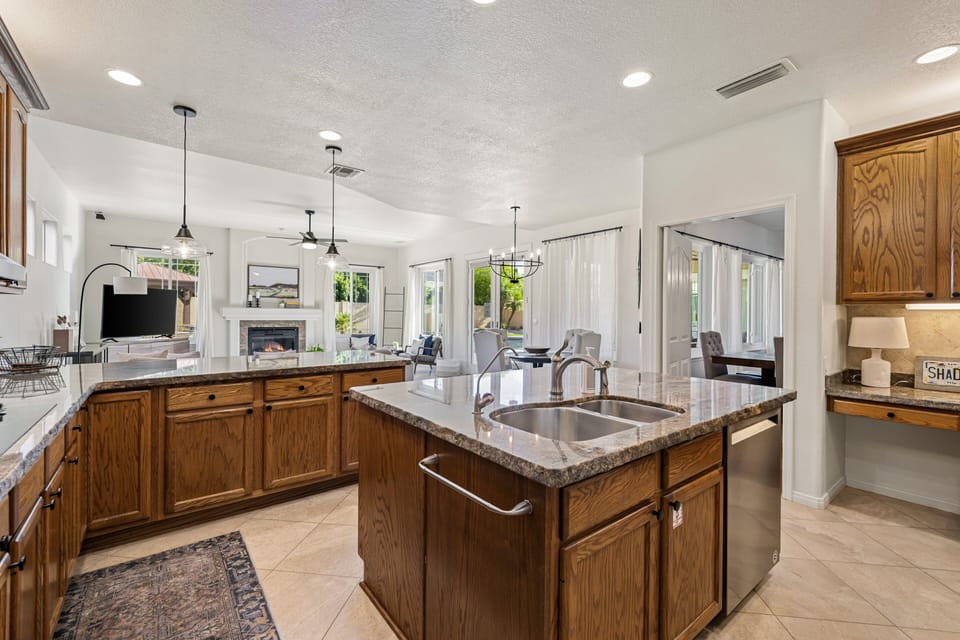 Kitchen Overlooks Living & Dining Area