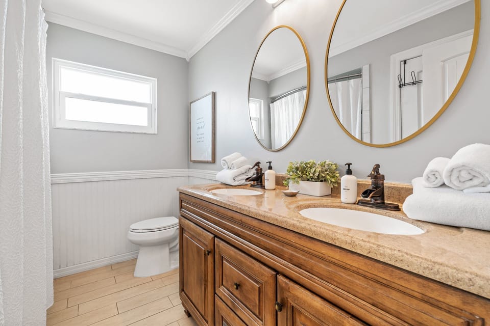 The shower/Tub Combo located in the hallway between Bedrooms 2 and 3.