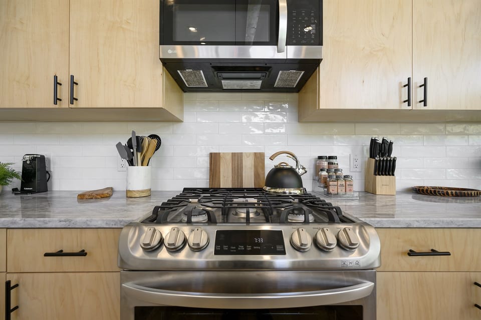 Kitchen Paradise: Whip up culinary delights in this sleek, modern gourmet kitchen!