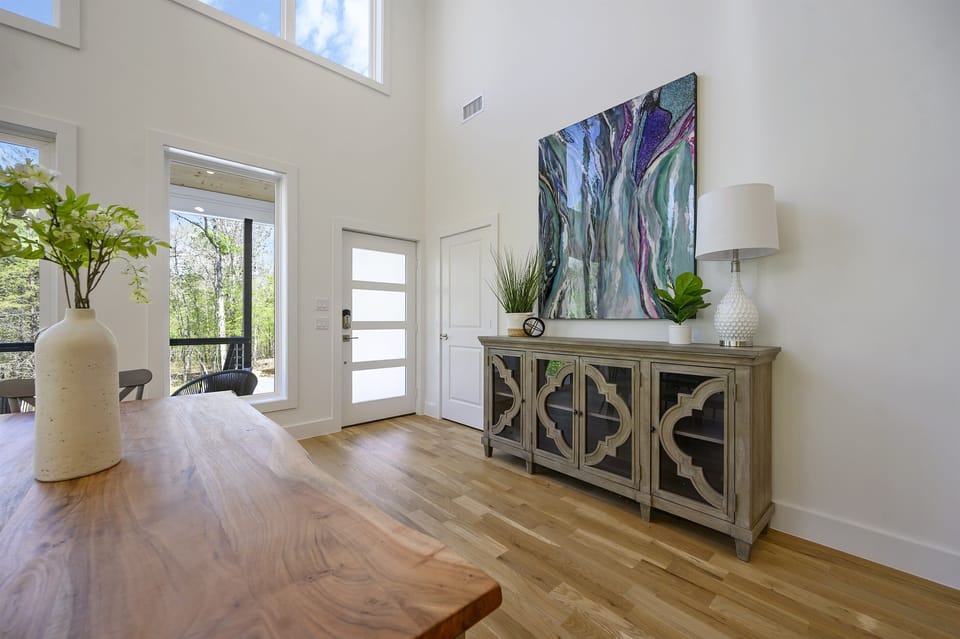 Entryway: Step into style with vibrant art and sun-drenched views of nature's beauty!