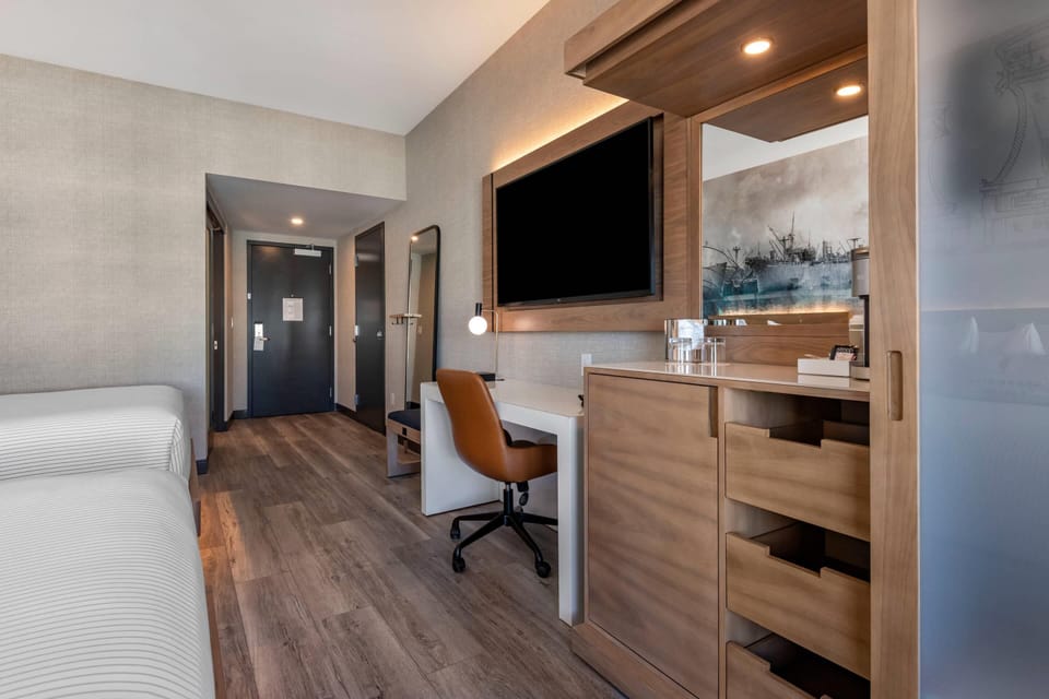 Standard Room, 2 Queen Beds, Non Smoking | In-room safe, desk, laptop workspace, blackout drapes