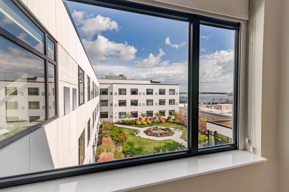 Suite, 1 King Bed, Non Smoking, Harbor View | In-room safe, desk, laptop workspace, blackout drapes