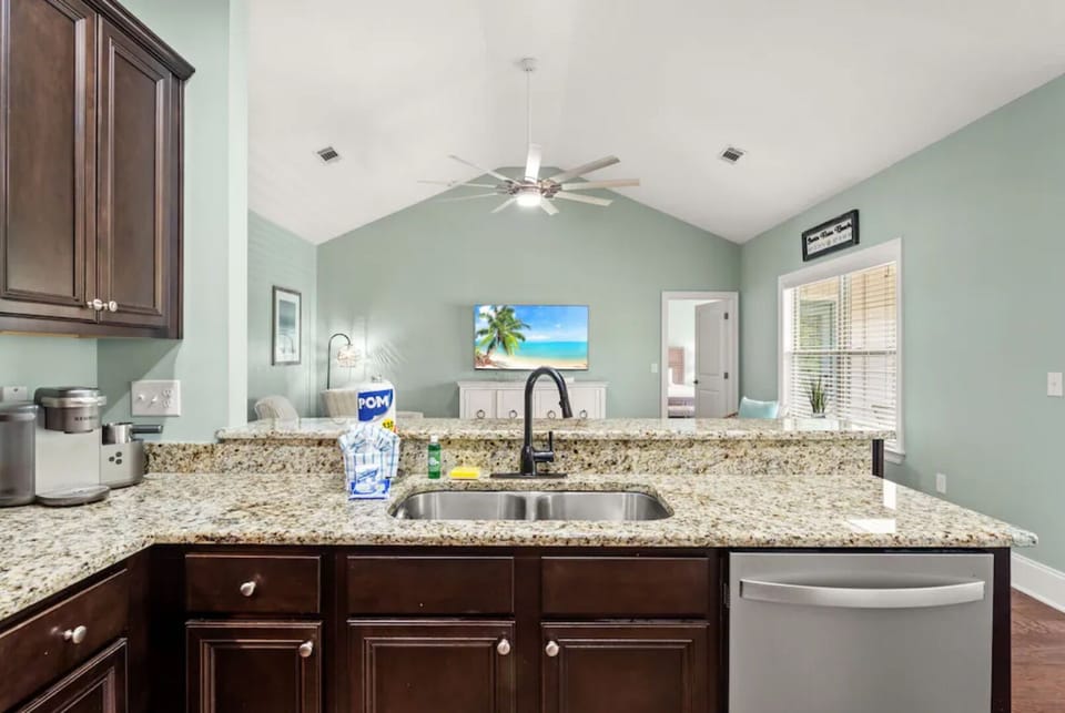 The gourmet kitchen overlooks the living areas.