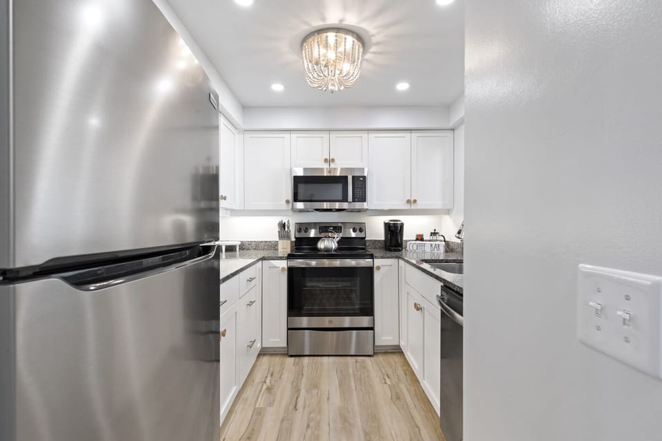 Kitchen with all of the small appliances you need to cook 