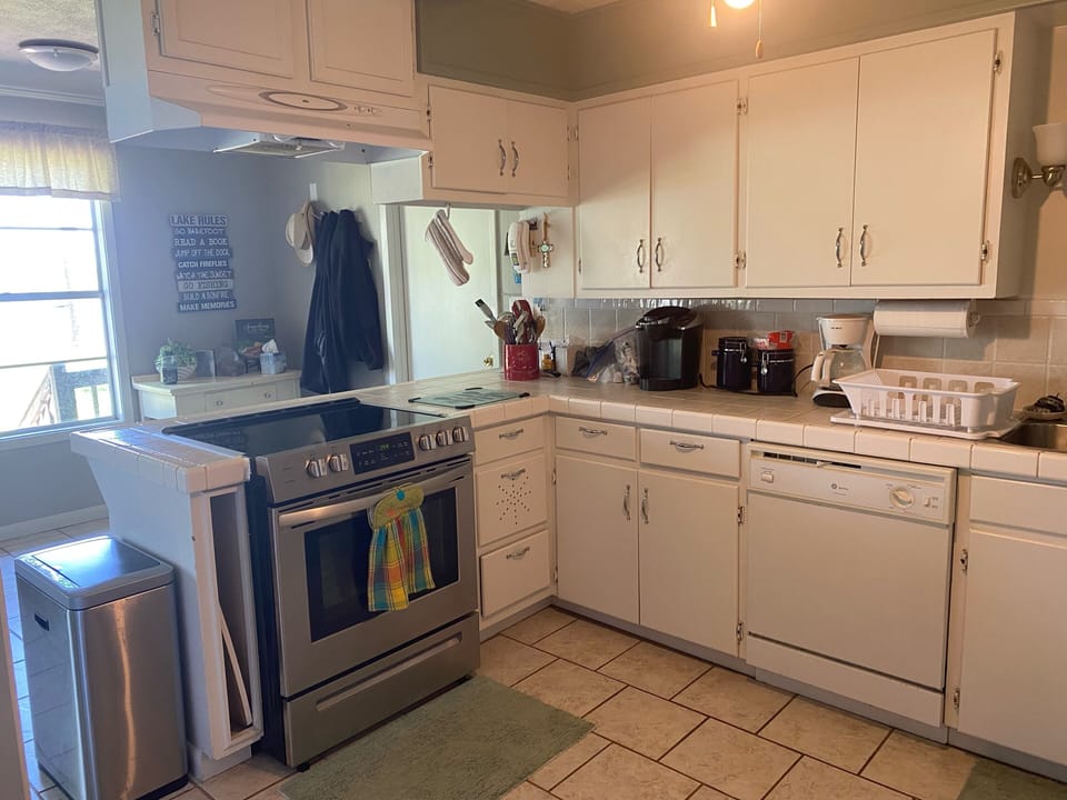 Full size kitchen, side by side refrigerator, microwave, coffee makers, blender…