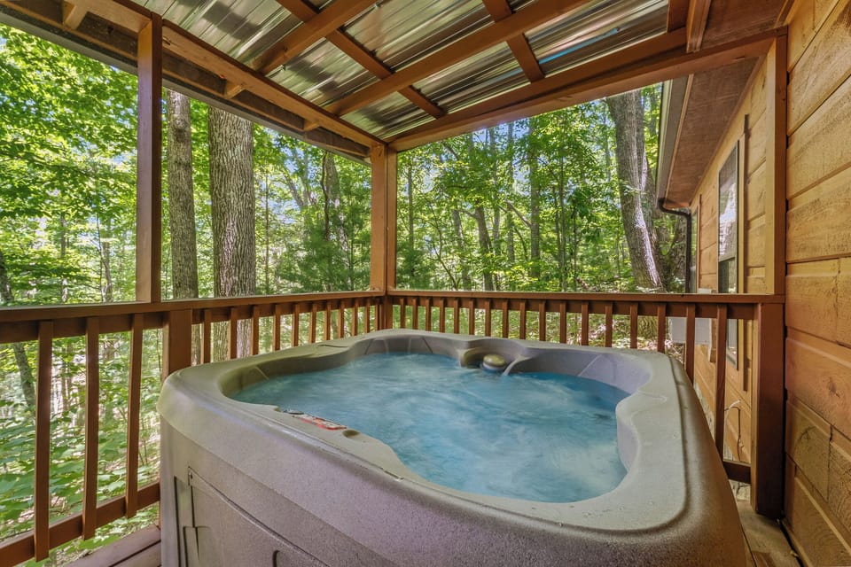 Your private hot tub under a covered deck — pure relaxation year-round