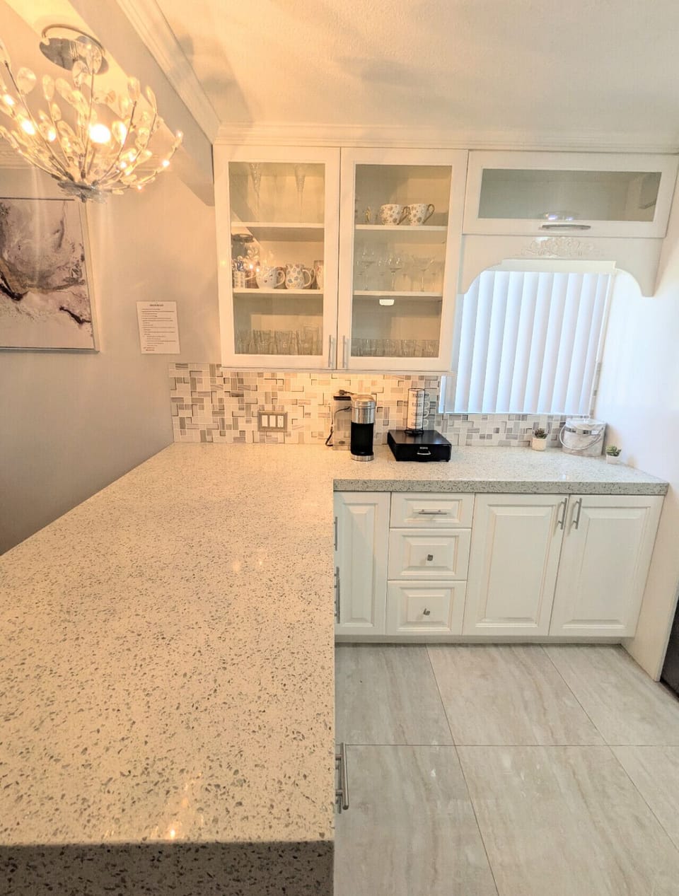 White cabinetry and granite counter tops