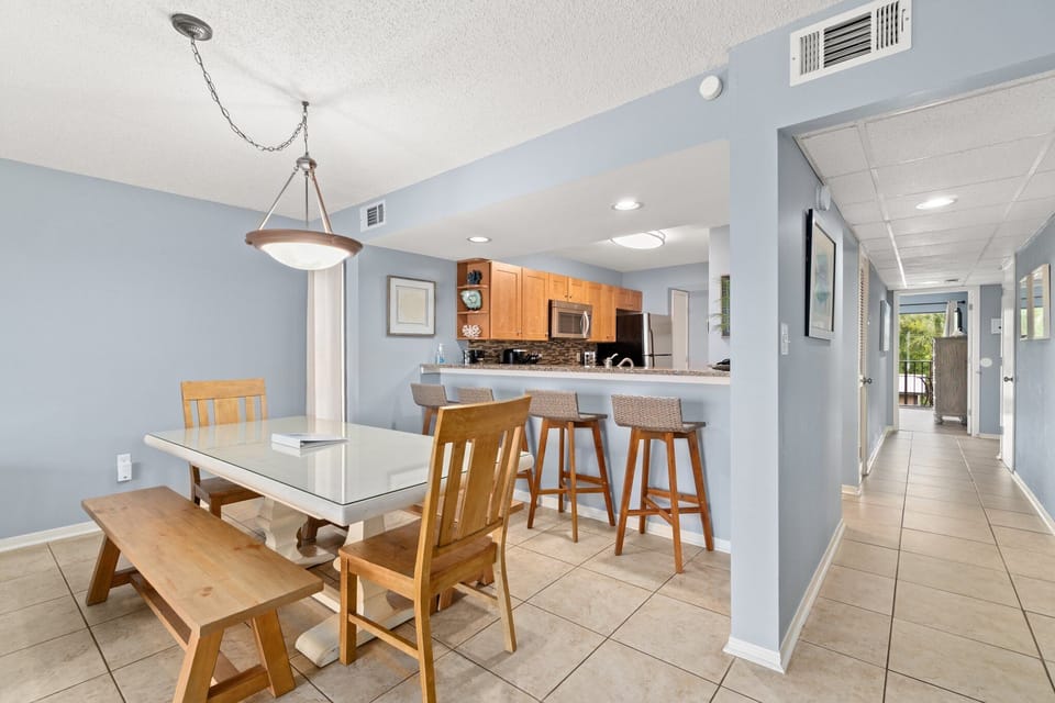 Dining Area- Barstools provide a casual dining option while traditional table promises fun conversation over meals