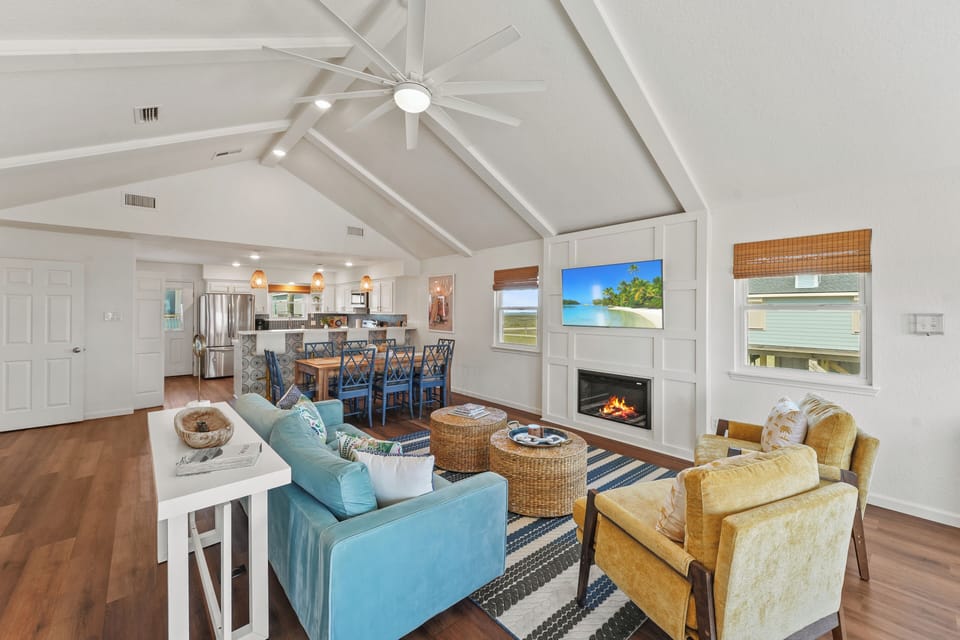 Kick back on the sofa and enjoy the warmth of the glowing fireplace.