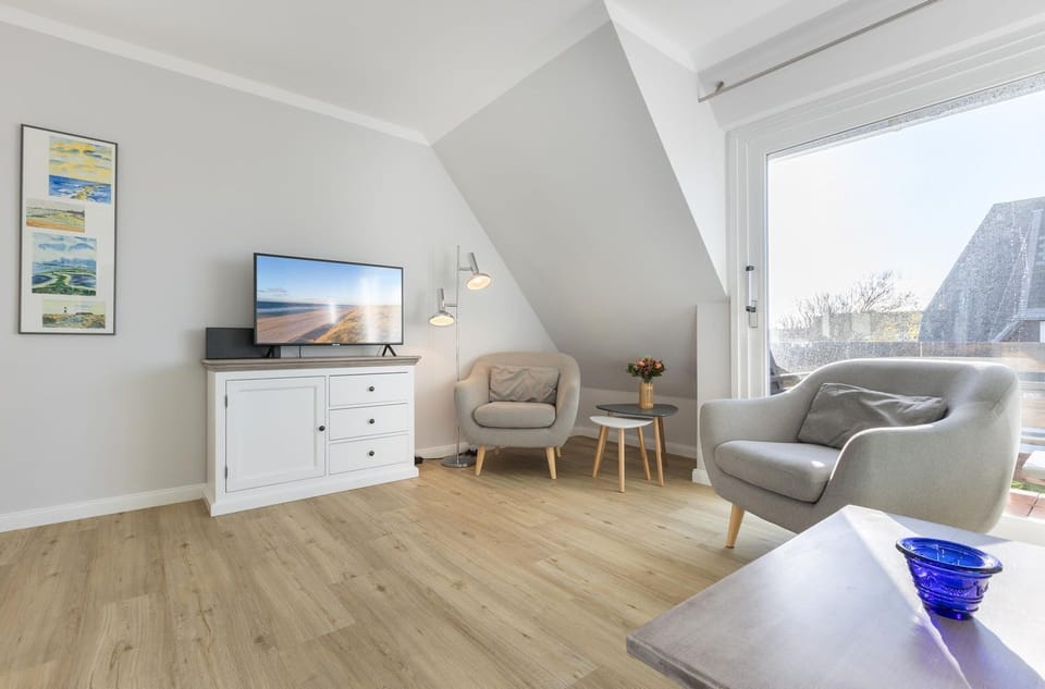 C-haus Carola. App 13 - Helle und Moderne 3-zimmer Ferienwohnung mit ca. 65 m² in Zentraler Lage, Apartment in Wenningstedt-Braderup
