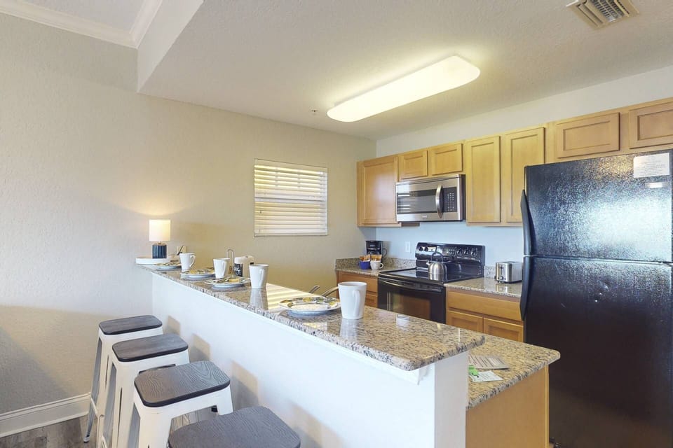 Fully Equipped Kitchen with Granite Counter Tops