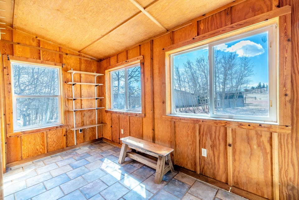 A sunny and bright mudroom provides plenty of storage for ski equipment, hiking gear or anything else you require