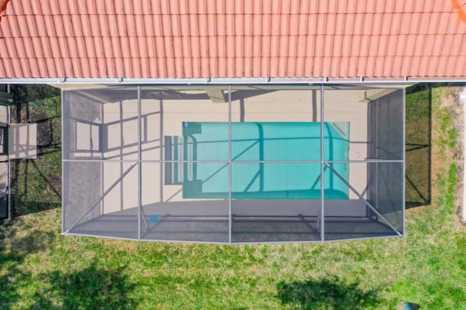 Screened in private pool with no rear neighbors!