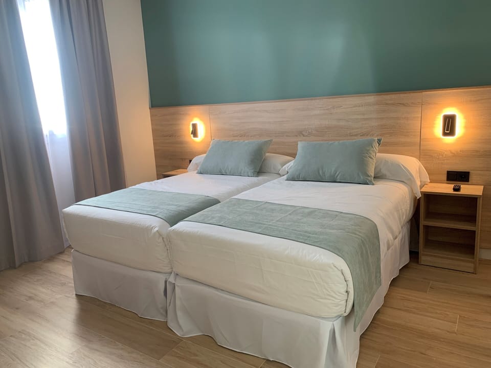 Down comforters, minibar, desk, blackout drapes