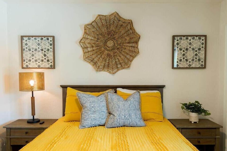 The queen room offers great decor to set the mood, while the closet provides ample space to unpack your things.