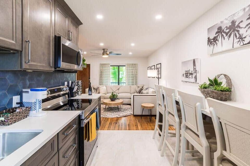 At the cozy four-seat breakfast bar you'll sip your morning coffee, break open the rum for an afternoon daiquiri, or set out a happy hour spread before you hit the town.