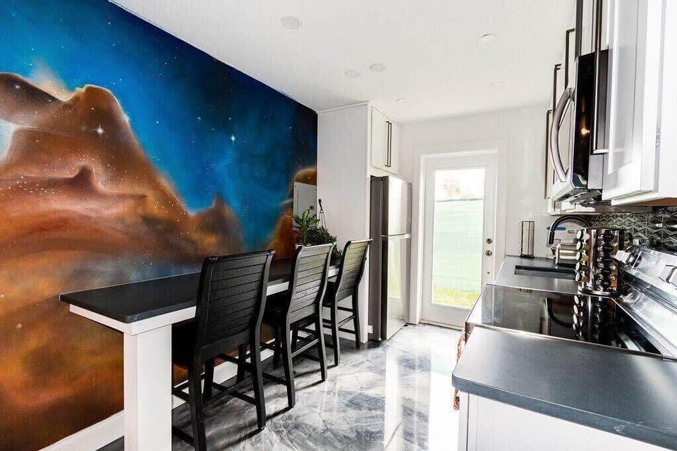 With brand new appliances and palms out every window, could you be anywhere else but a dreamy condo on the Florida coast?
