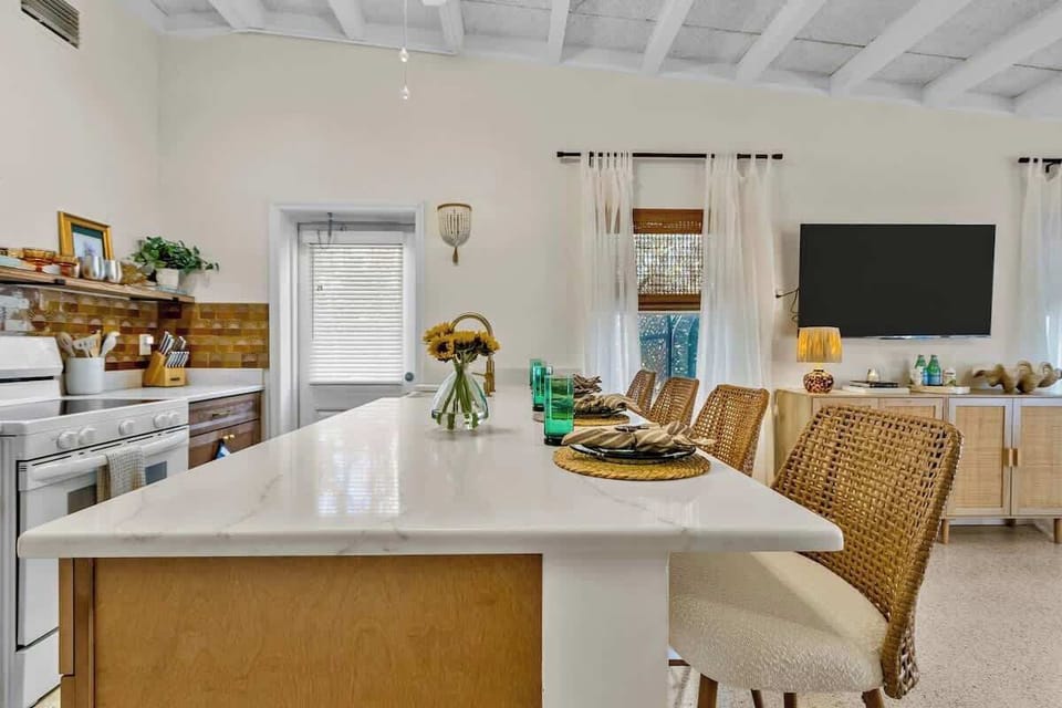 Enjoy a delicious meal while seated at the kitchen counter! There are four comfortable stools at counter height.