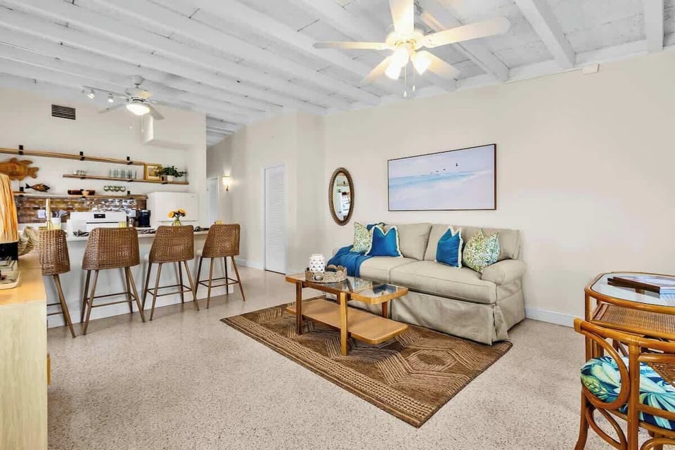 The living room has a pull-out queen sofa bed.