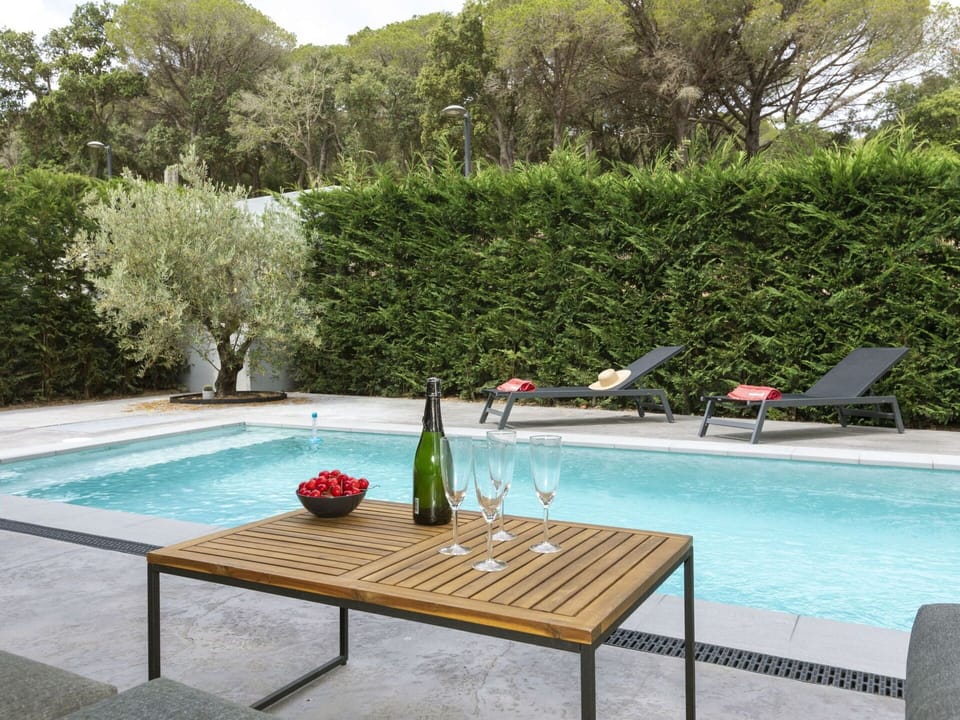 Water, Property, Plant, Furniture, Building, Swimming Pool, Azure, Table, Sports Equipment, Tree