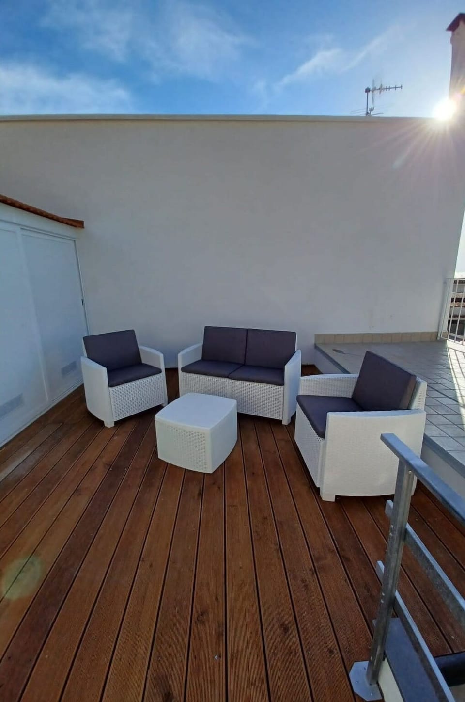 Sky, Cloud, Wood, Shade, Outdoor Furniture, Interior Design, Rectangle, Couch, Flooring, Floor