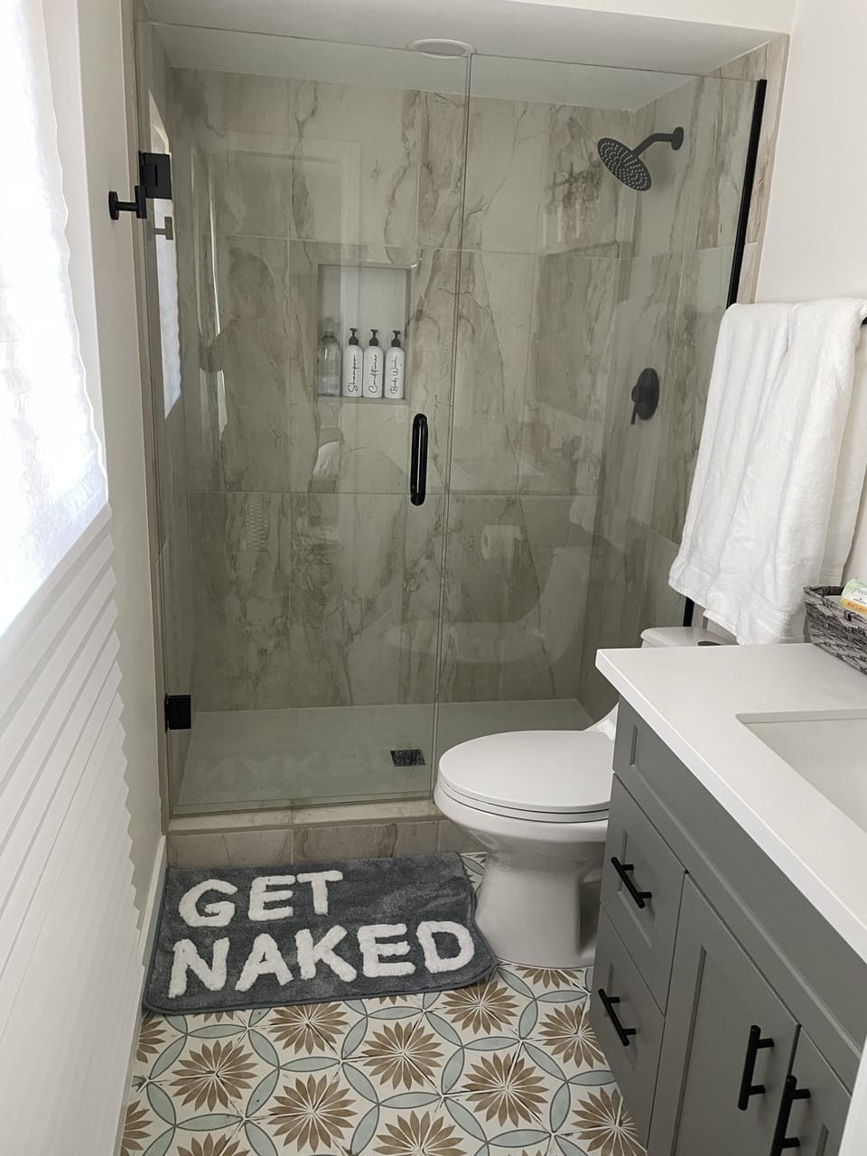 Primary bathroom with complementary shampoo, conditioner and body wash